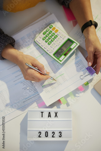 tax time. accountant woman working with documents