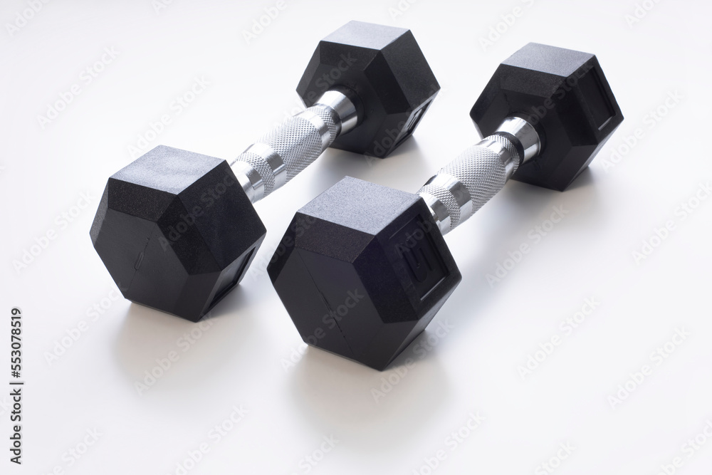 Two dumbbells on white Two dumbbells on white