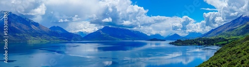 Panoramic view of beautiful reflections in alpine lake