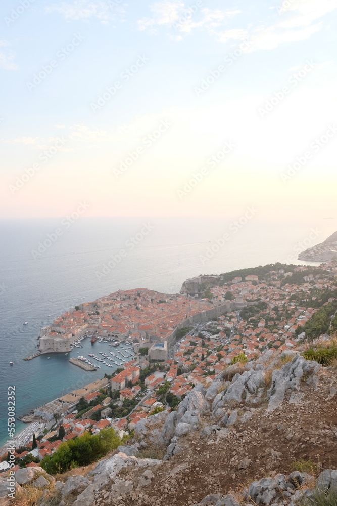 The City of Dubrovnik, Croatia, at sunset as seen from above from the viewpoint of Srd Hill. The UNESCO World Heritage Site and the famous walled city is surrounded by the Adriatic sea.