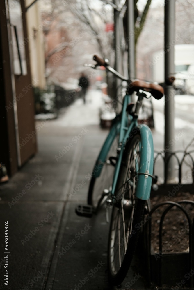 Retro vintage blue bike with leather sear in new york city manhattan