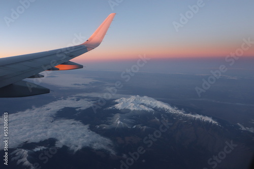 Airplane Window View W Sunrise Somewhere over Colorado