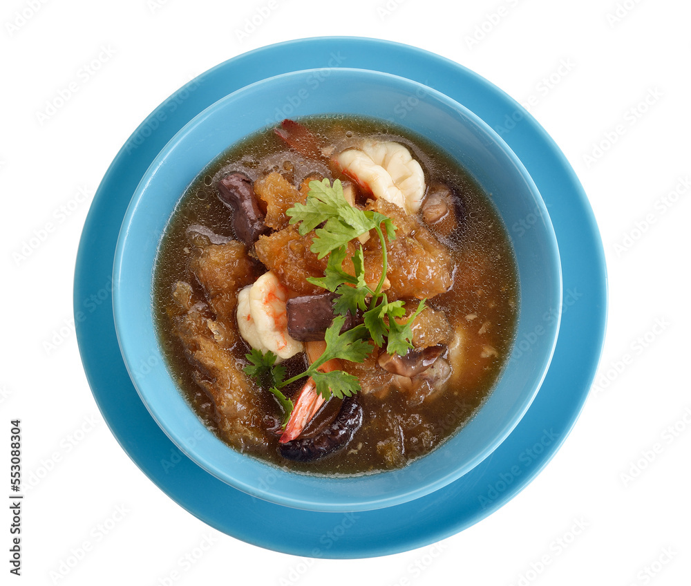 Maw stewed in gravy, red shrimp in a bowl on white background Maw stewed in gravy, red shrimp in a bowl on white background