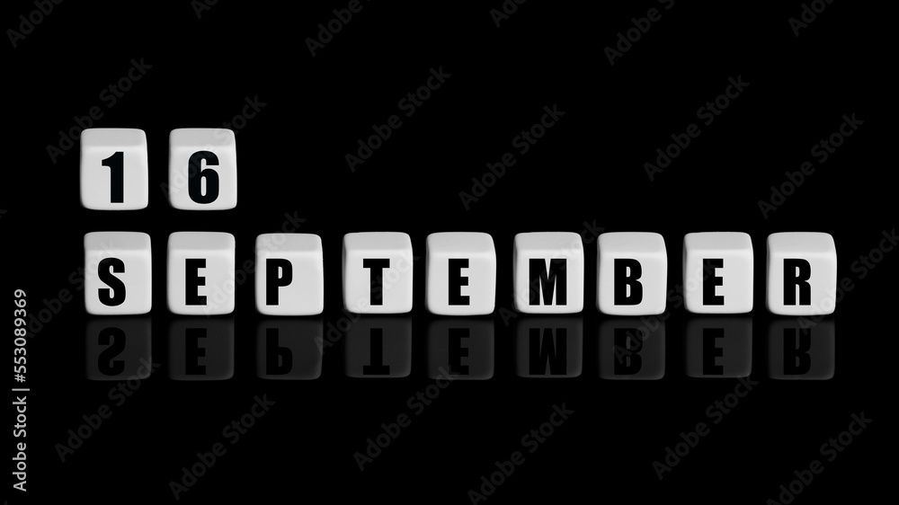 September 16th. Day 16 of month, Calendar date. White cubes with text on black background with reflection. Autumn month, day of year concept