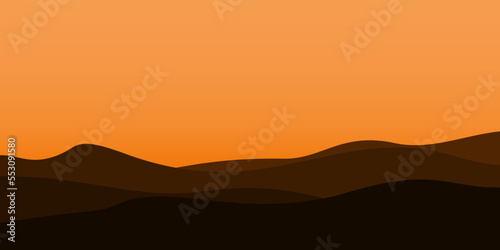 silhouette views of mountains with sunset background