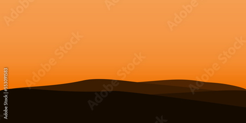 silhouette views of mountains with sunset background