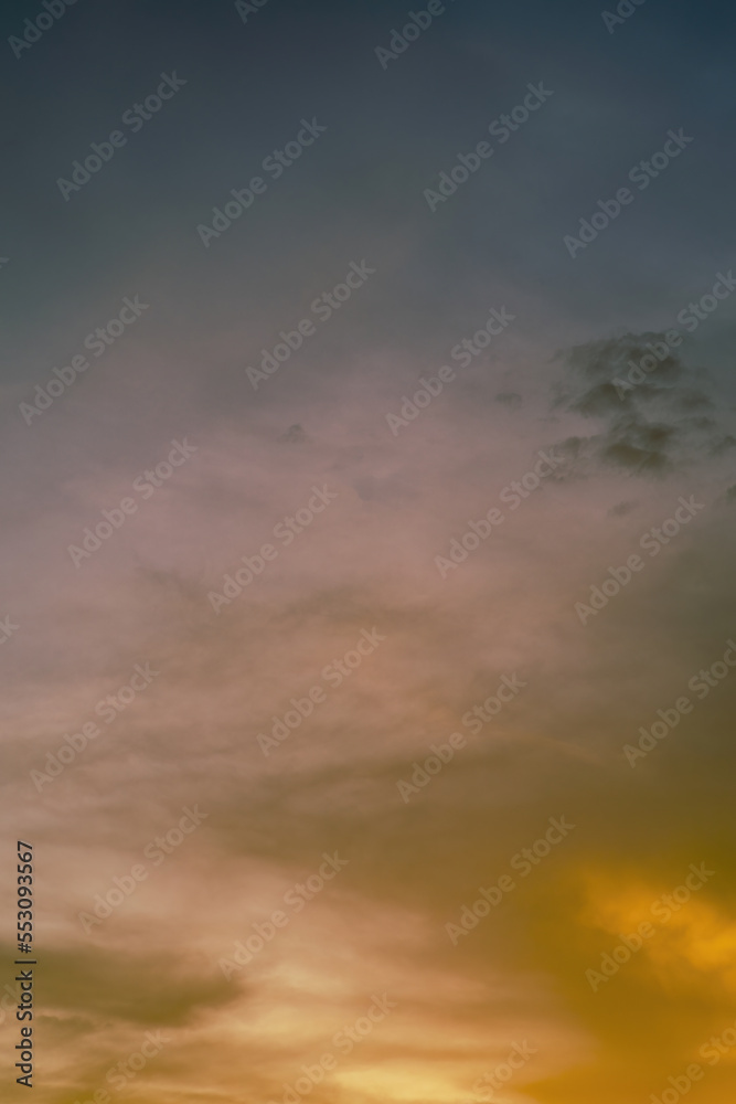 Fototapeta premium Golden sunset sky background with beautiful clouds.