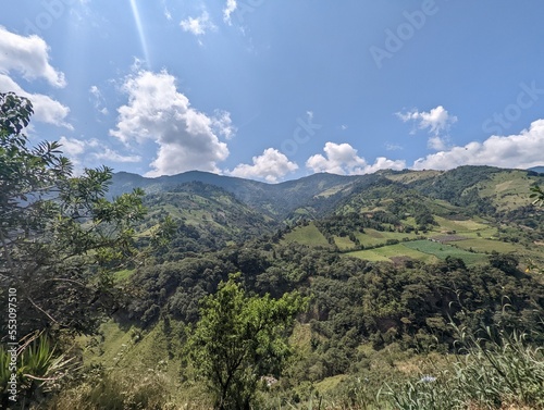 green mountains with clouds in the ecuadorian alps
