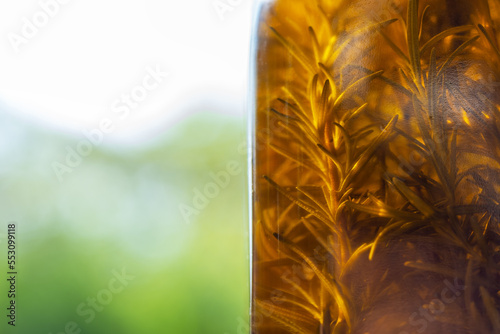 Принти на полотні a close up of easy homemade rosemary infused olive oil for cooking and soap maki
