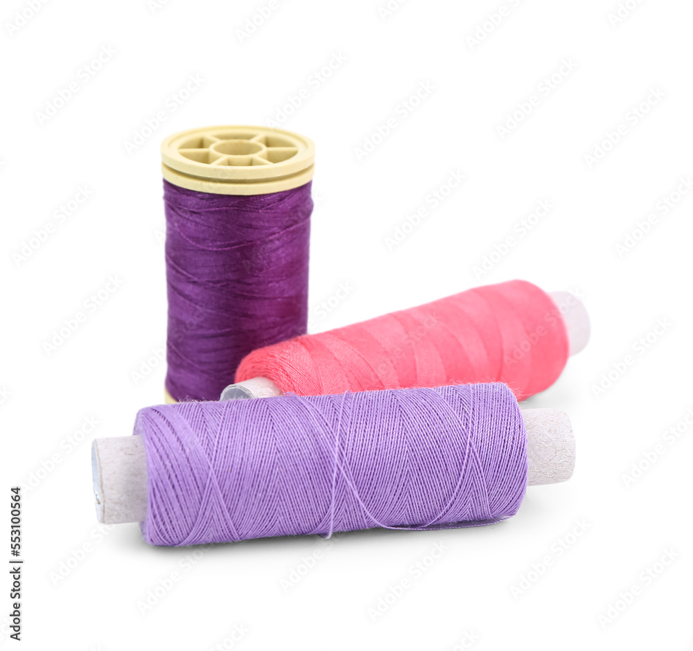 Colorful thread spools isolated on white background Colorful thread spools isolated on white background