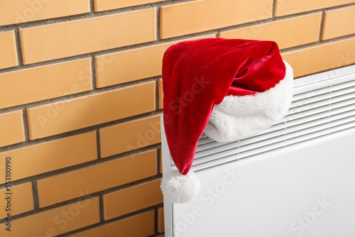 Red santa hat on a white el...