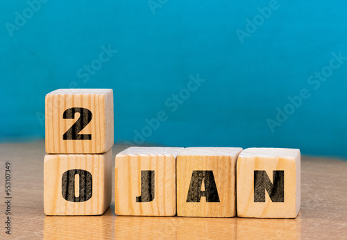 Valokuva Cube shape calendar for January 20 on wooden surface with empty space for text,c