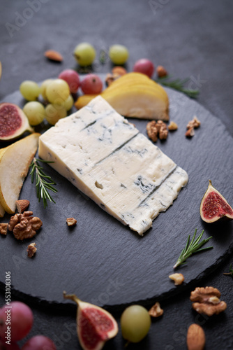 Traditional Italian Gorgonzola cheese on stone seving board