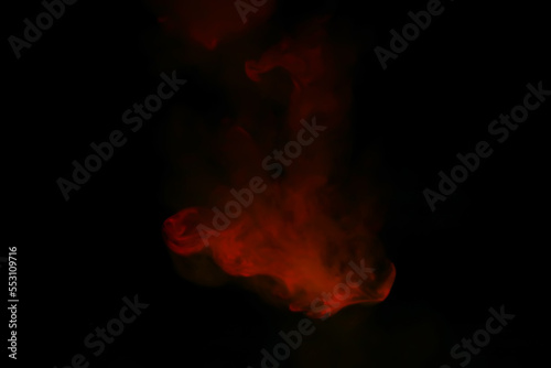 Red smoke over black studio background. Red steam on a black background. Copy space. © alexkich