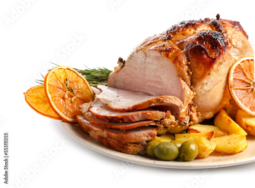 Plate with tasty Christmas ham, potato, olives and dried citruses on white background