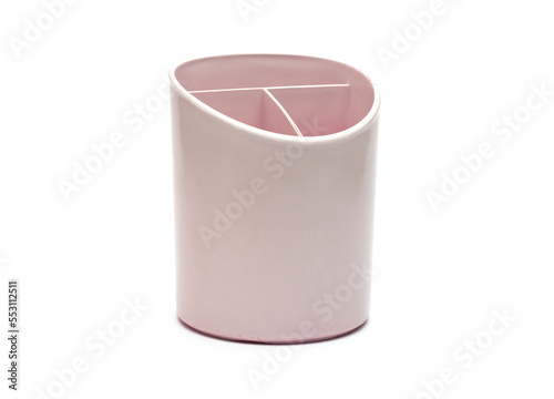 Used plastic pen or pencil holder box on isolated white background