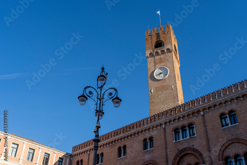 Beautiful Piazza dei Signori is the Palazzo dei Trecento. Watch tower in the city center of Treviso, Italy. photo