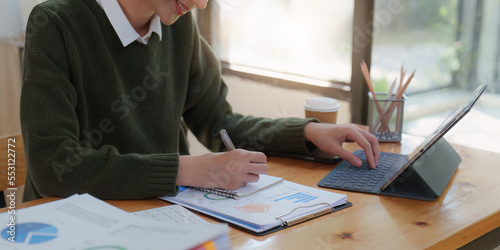 Bild auf Leinwand Asian Business woman making prepare presentation or important email of financial