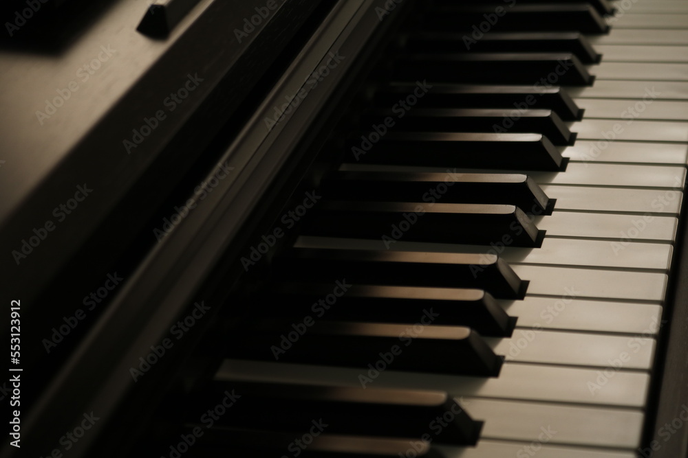 Piano, keyboard close up instrument playing music, practing and celebrate in dark room