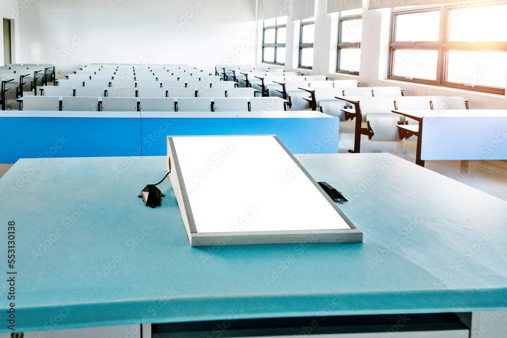 Seminar podium with blank screen in an university Seminar podium with blank screen in an university