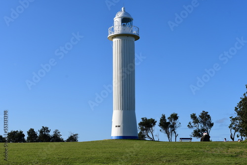 Yamba Lighthouse, NSW, Australia: a white lighthouse that has been providing a permanent light for local shipping since 1880.