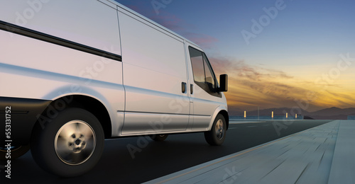 Van delivery on road at sunrise