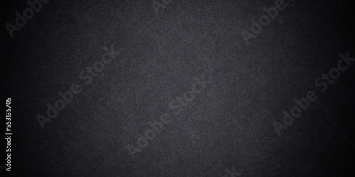 Horizontal black board or chalkboard wall grunge texture background