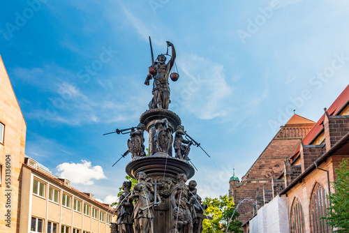 Germany, Bavaria, Nuremberg,Statues of 16th century Tugendbrunnen fountain photo