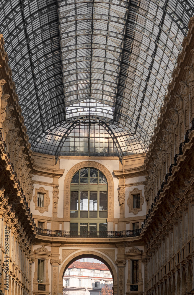 Details of Galleria Vittorio Emanuele II, is Italy's oldest active shopping gallery and a major landmark of Milan in Italy. Housed within a four-story double arcade in the centre of town Details of Galleria Vittorio Emanuele II, is Italy's oldest active shopping gallery and a major landmark of Milan in Italy. Housed within a four-story double arcade in the centre of town