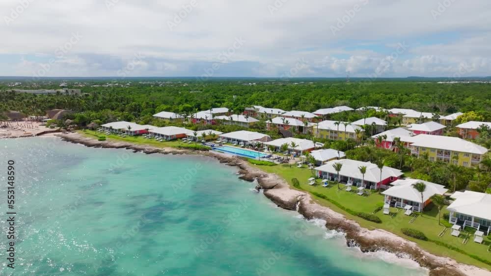 Aerial view of of resort and Playa Blanca with swimming pool and Caribbean sea in Dominican Republic Aerial view of of resort and Playa Blanca with swimming pool and Caribbean sea in Dominican Republic