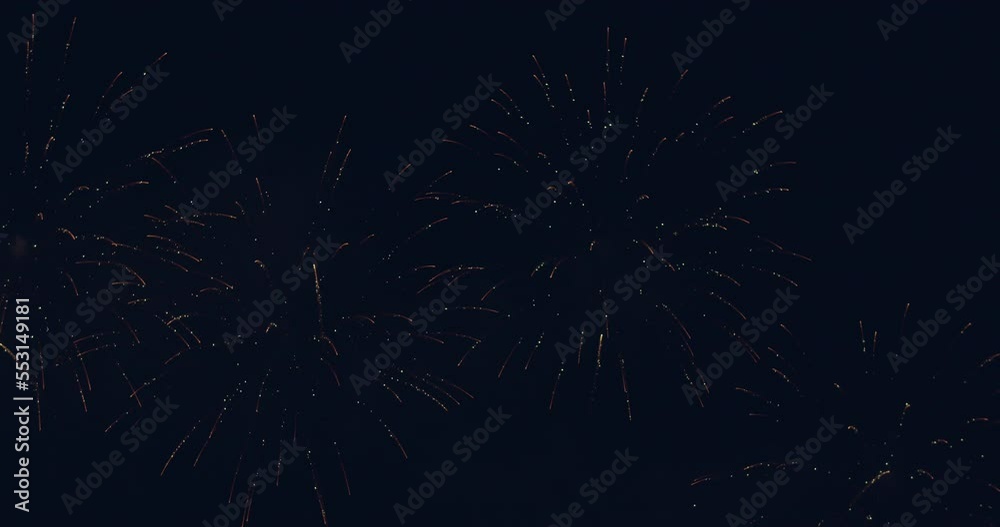 New year's eve fireworks display celebration loop seamless of real fireworks background with abstract multicolor big shining glowing fireworks show with bokeh lights in the night sky. 4KDCI New year's eve fireworks display celebration loop seamless of real fireworks background with abstract multicolor big shining glowing fireworks show with bokeh lights in the night sky. 4KDCI