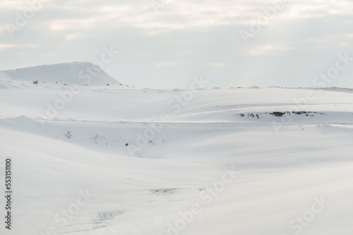 Winter landscape, hills covered in white snow