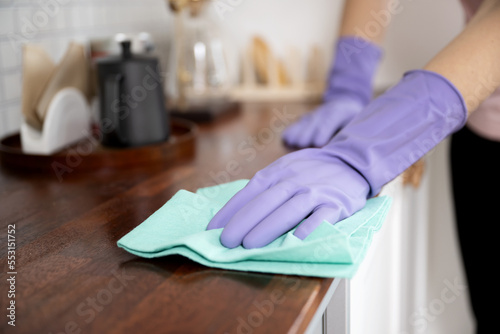 Woman's hands wiping in the sink