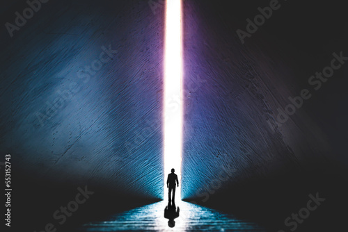 Fototapeta Naklejka Na Ścianę i Meble -  The silhouette of a man walking towards a bright light in the opened huge wall. A light in the end of a tunnel. The concept of success, freedom of choice, open mind, meditation.