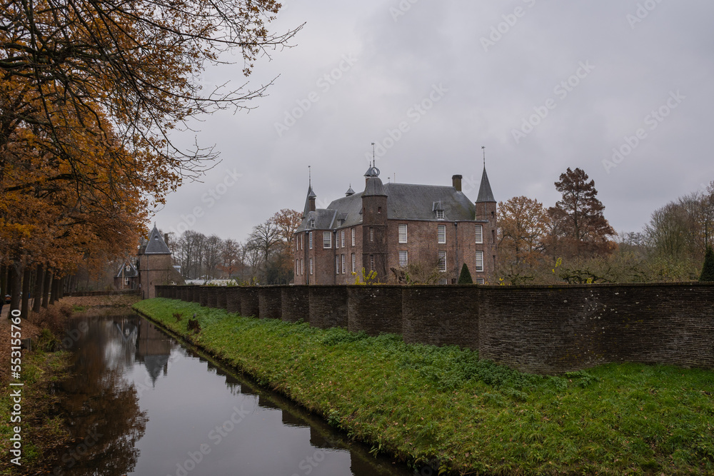 The outside walls of the historic building Zuylen castle or slot Zuylen as it is called in Dutch on a cold winter day. includes the bridge, keep, gate moat and main building