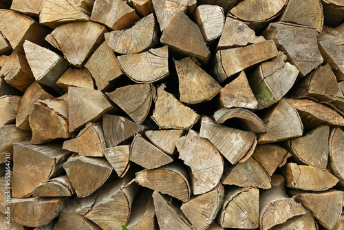 Pile of chopped firewood as background, closeup