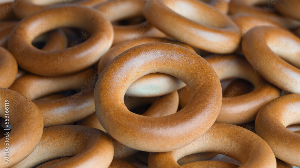 Tasty dry bagels (sushki) as background, closeup Tasty dry bagels (sushki) as background, closeup