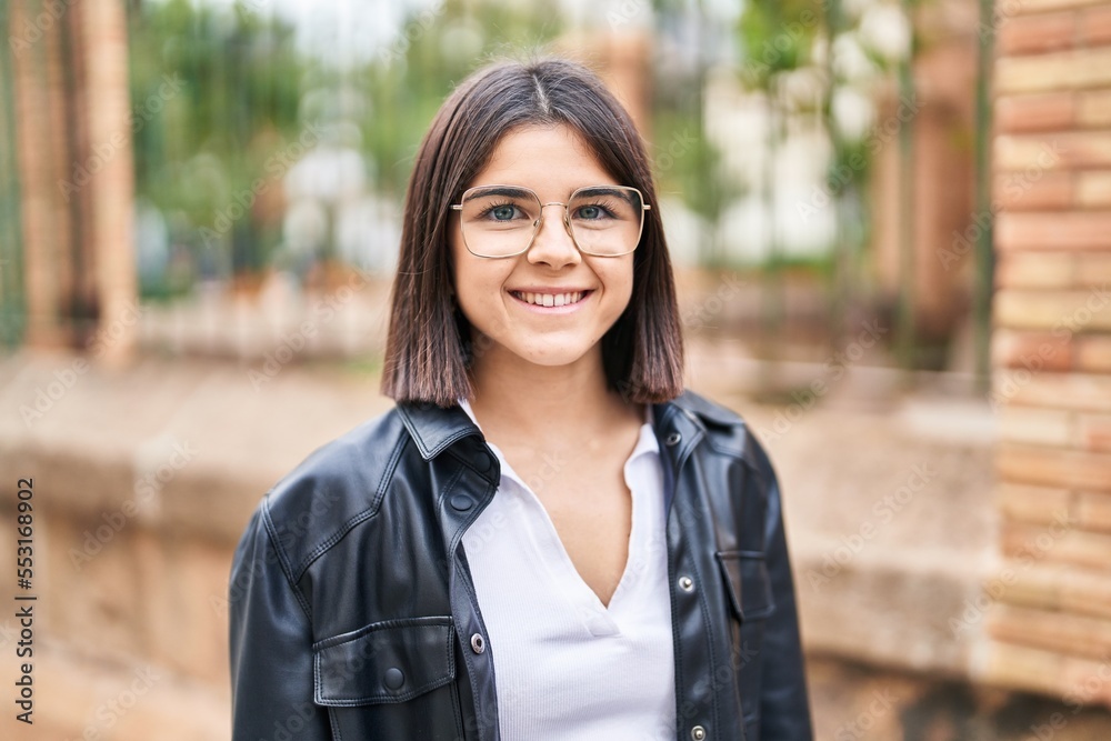 Young beautiful hispanic woman smiling confident standing at street Young beautiful hispanic woman smiling confident standing at street