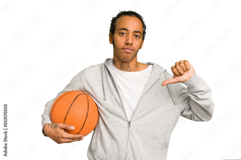 Young african american man playing basketball isolated showing a dislike gesture, thumbs down. Disagreement concept.