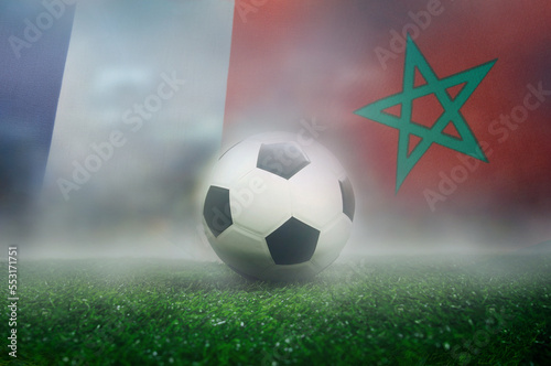 France vs Morocco football match , Semi-finals , national flags and soccer ball on green grass