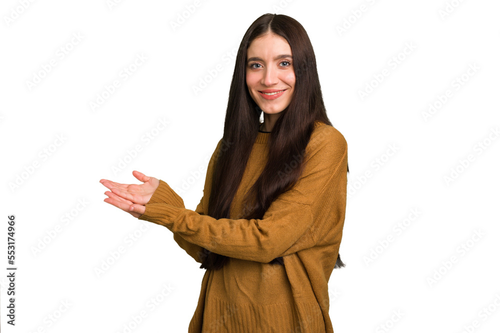 Young caucasian brunette long hair woman cutout isolated holding a copy space on a palm. Young caucasian brunette long hair woman cutout isolated holding a copy space on a palm.