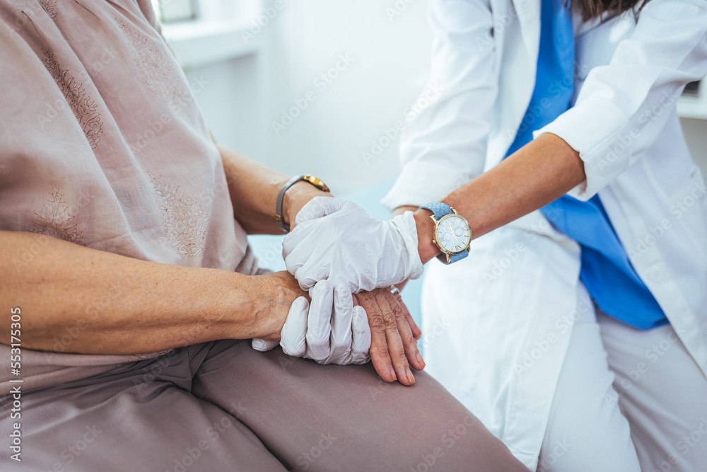 Doctor and patient are discussing something in clinic, just hands at the desk. Medicine and best service concept. Healthcare worker giving support and love to a patient. Coronavirus pandemic concept. Doctor and patient are discussing something in clinic, just hands at the desk. Medicine and best service concept. Healthcare worker giving support and love to a patient. Coronavirus pandemic concept.