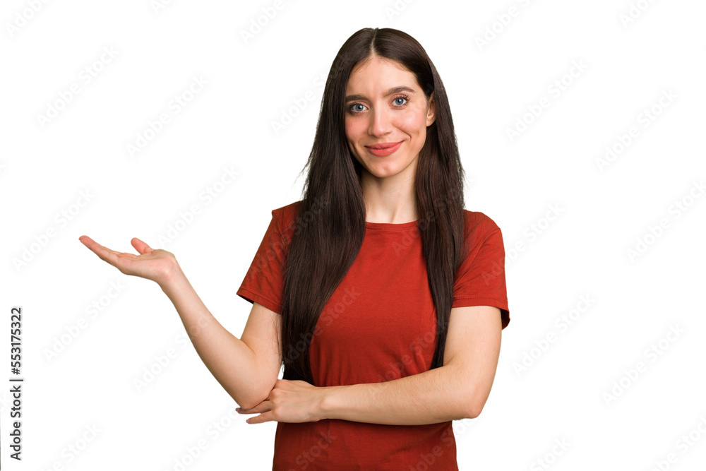 Young caucasian brunette long hair woman cutout isolated showing a copy space on a palm and holding another hand on waist. Young caucasian brunette long hair woman cutout isolated showing a copy space on a palm and holding another hand on waist.