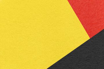 Texture of craft yellow color paper background with red and black border. Vintage abstract cardboard.