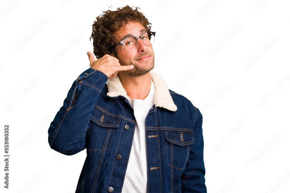 Young curly smart caucasian man cut out isolated showing a mobile phone call gesture with fingers. Young curly smart caucasian man cut out isolated showing a mobile phone call gesture with fingers.