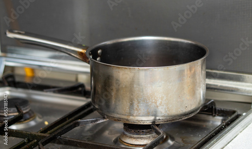 The pot is on a gas stove.