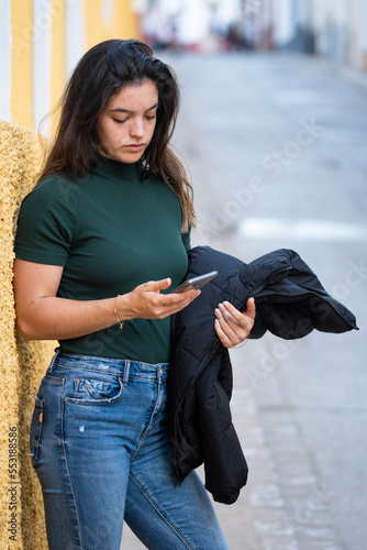 Young woman visiting the streets of Sanlucar de Barrameda