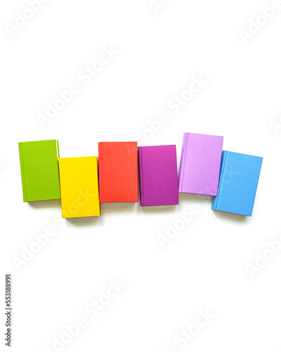 Multicolors books minimal pattern with bright colorful cover, handback books, Top view mockup for library, education theme. Read paper book and study concept. Isolated on white background