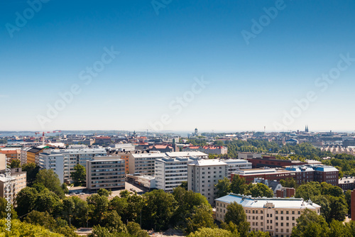 Aerial view of Helsinki center from amusement park Linnanmaki at sunny summer day.