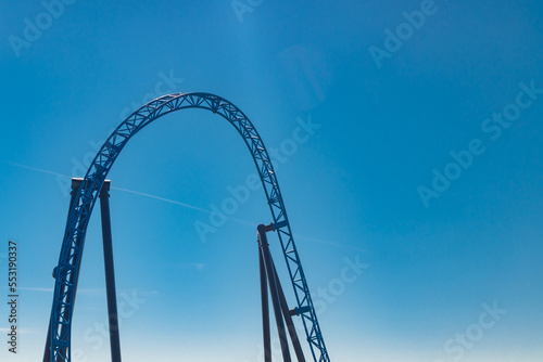 Empty ride roller coaster on sky background in amusement park